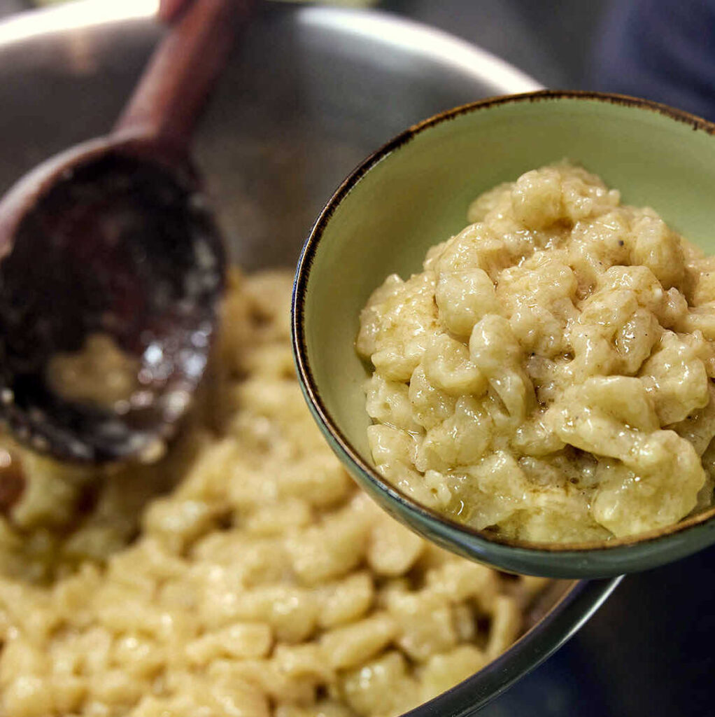 Prima ancora che un piatto, i celebri gnocchi di malga sono parte integrante dell'identità della Lessinia più autentica